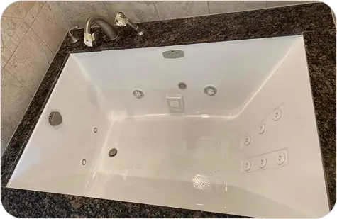 Refinished tiles with clean grout lines and polished look