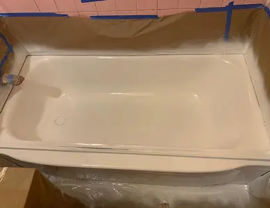 Resurfaced bathtub after restoration with bright like-new finish