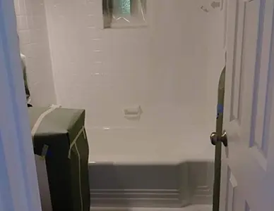 Refinished ceramic tiles after resurfacing with bright renewed look