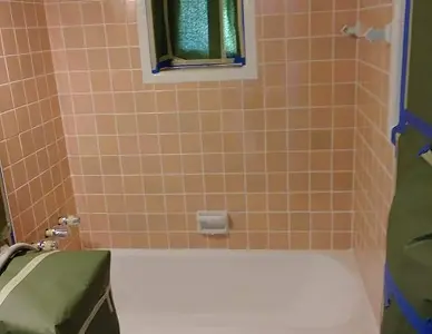 Old ceramic tiles before resurfacing showing discoloration and wear