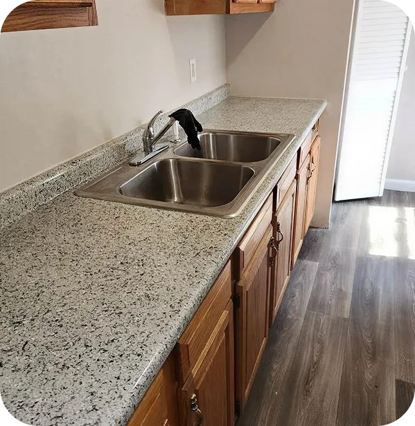 Professional countertop refinishing with smooth modern finish.