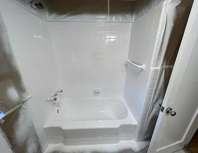 Bathroom tiles after refinishing with smooth glossy finish