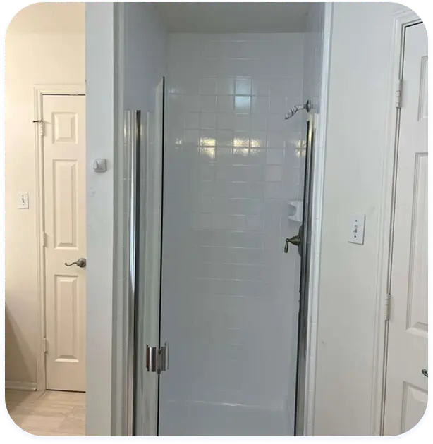 Professional shower refinishing with smooth, glossy restored surface