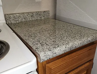 Countertop after refinishing – smooth, glossy, newly restored surface